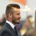 David Beckham with the Olympic Flame 