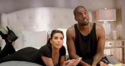 Kanye West and Kim Kardashian on bed