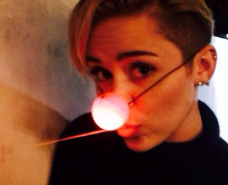 miley-cyrus-with-rudolph-nose-1387794707