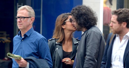 Aidan Turner seen kissing a mystery girl